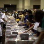 People check out vendor wares