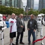 The ribbon cutting ceremony with Englund and Henriksen