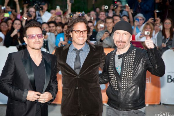Bono, Davis Guggenheim and The Edge on the red carpet Bono, Davis Guggenheim and The Edge on the red carpet