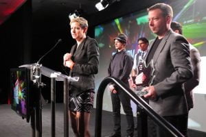 An emotional Anne Gibeault accepts the Game of the Year award for Far Cry 3