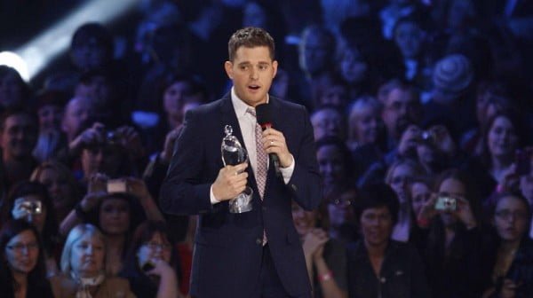 Michael Buble accepts an award at the 2010 Junos