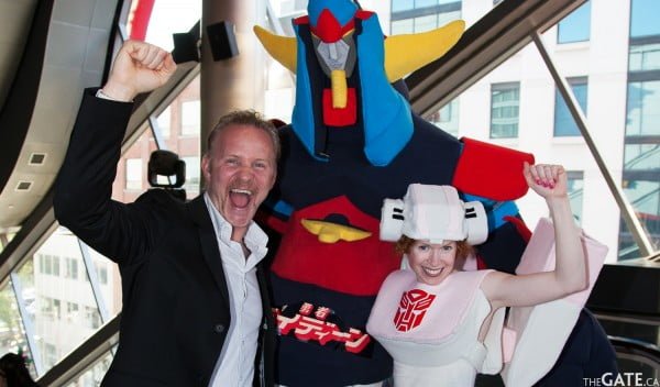 Director Morgan Spurlock with two costumed fans