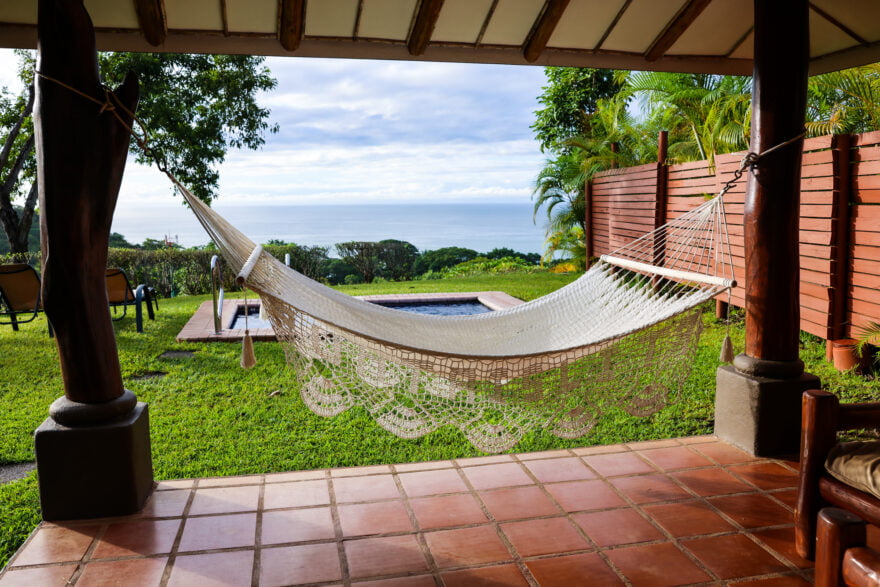 Our suite's back yard, with chairs, plunge pool, and hammock