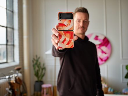 Artist Ben Johnston with his Samsung Galaxy Z Flip4 design