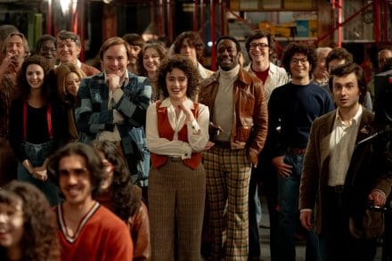 Gilda Radner (Ella Hunt), Jane Curtain (Kim Matula), Dick Ebersol (Cooper Hoffman), Rosie Shuster (Rachel Sennott), Garrett Morris (Lamorne Morris), Alan Zweibel (Josh Brener) and Lorne Michaels (Gabriel LaBelle) in Saturday Night.