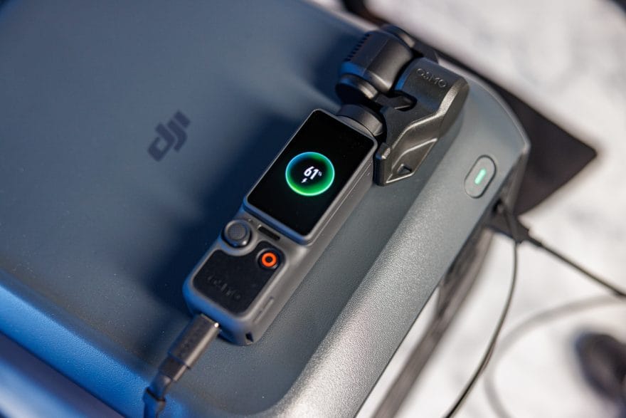 The Osmo Pocket 4 charging with the DJI Power 1000 Mini